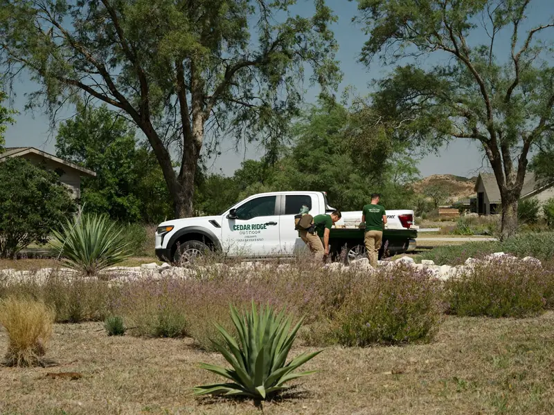 The Cedar Ridge crew unloading plants from the company truck